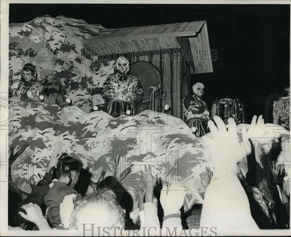 1973 Pegasus Parade float passes by crowds on Mardi Gras  - Historic Images