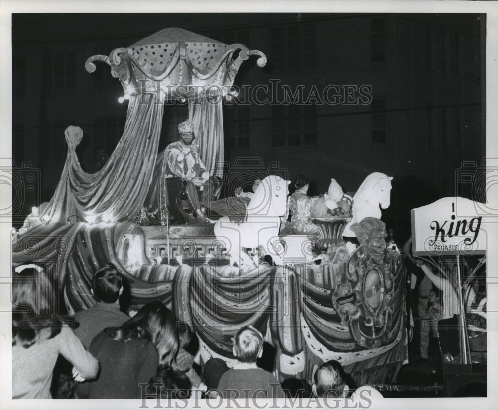 1969 King Pegasus Smiles on His Krewe of Pegasus Parade Float - Historic Images