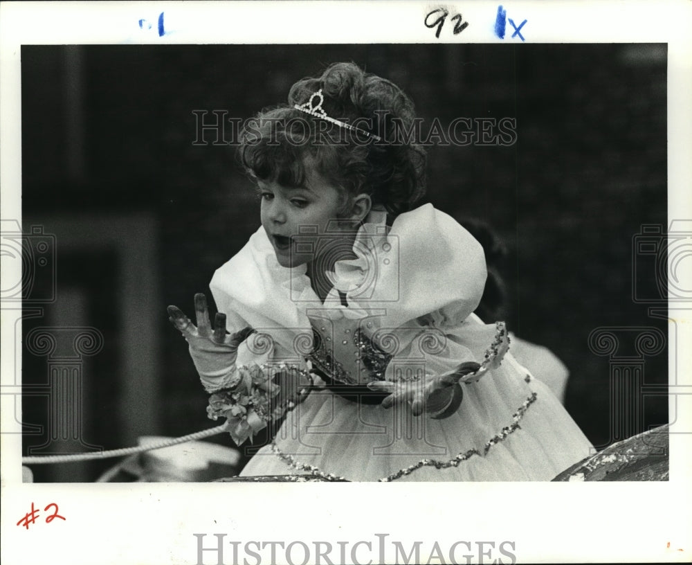 1983 Christa Lincks of Krewe of Thoth Parade Is Out of Doubloons - Historic Images