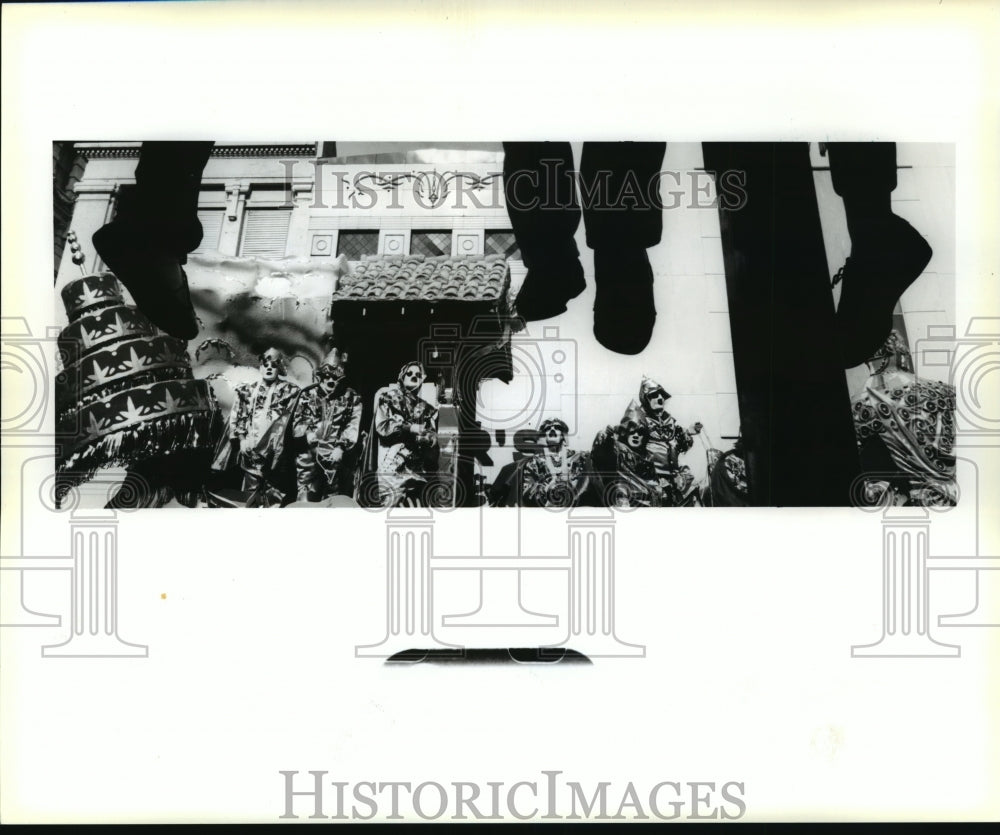 1991 Parade Goers Sit on Bus Shelter to Watch Rex Parade at Carnival - Historic Images