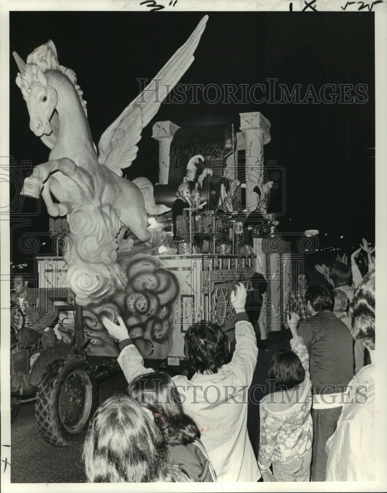 1979 Carnival Parade Lead float in Krewe of Pegasus rolls through. - Historic Images