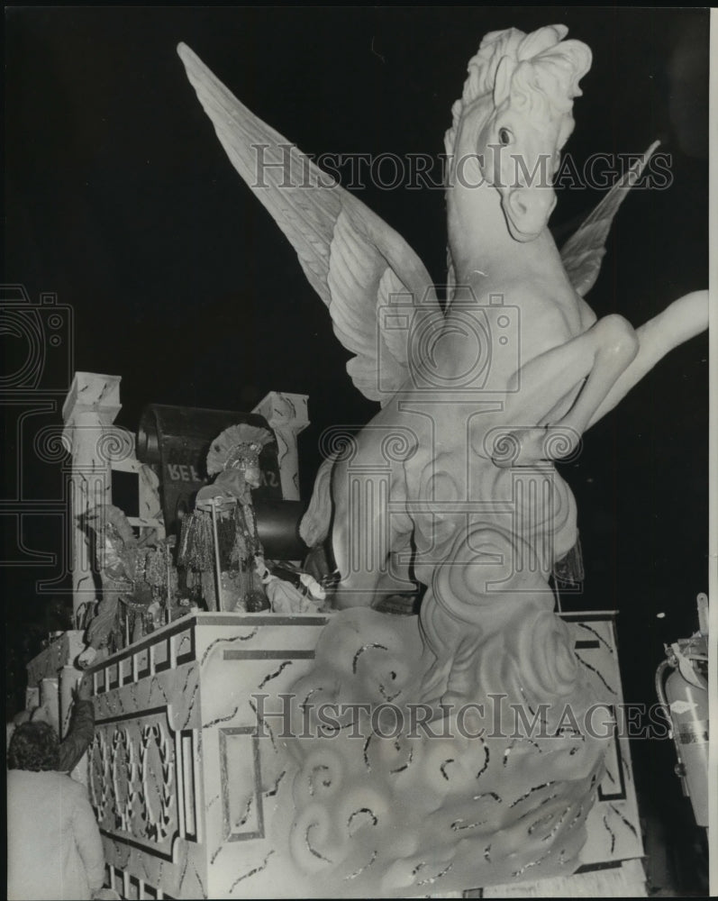 1977 Carnival Parade Giant Pegasus leads the way on front of float. - Historic Images