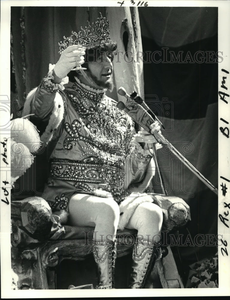 1987 Carnival Parade Rex, William Waller Young Jr. toasts Queen. - Historic Images