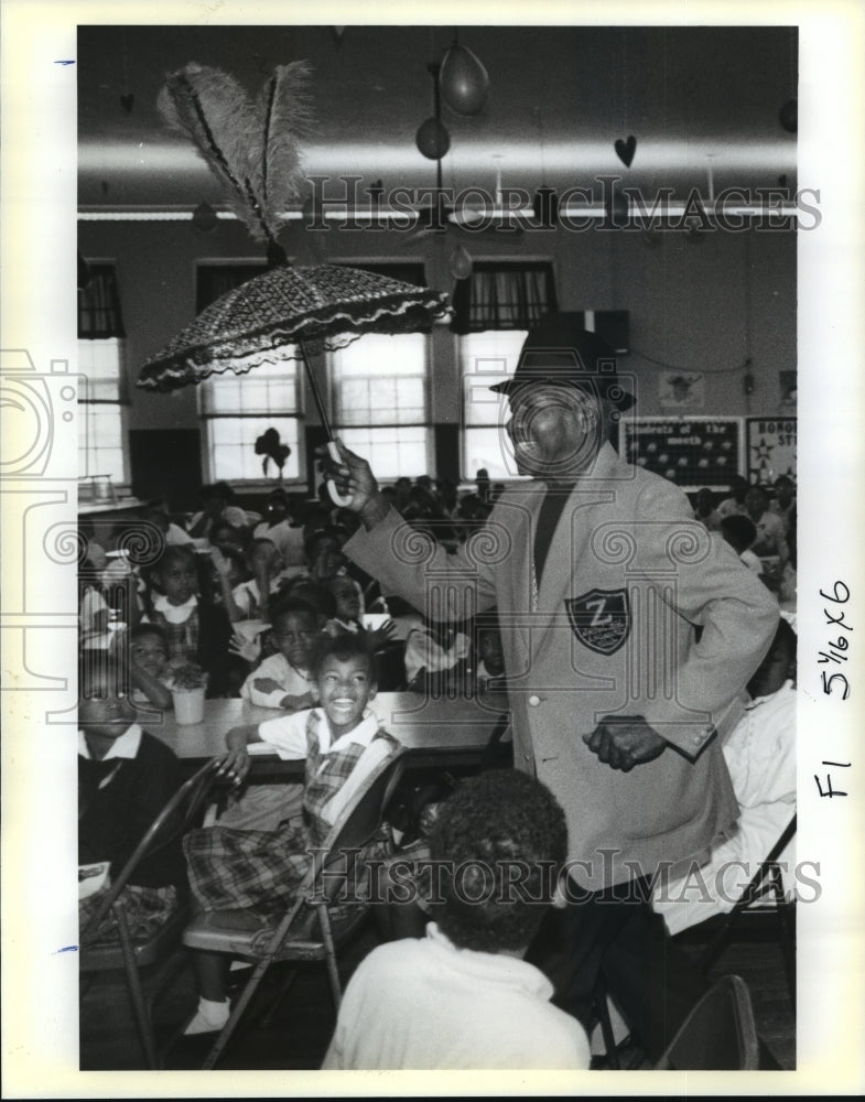 1989 Carnival Organizations Maurice F.X. Jeff Sr. struts at assembly - Historic Images