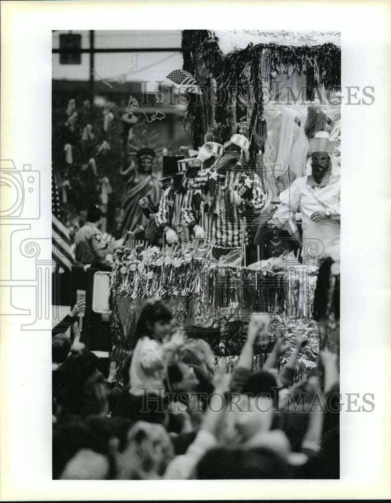 1991 Maskers Throw Beads at Covington Lions Club Carnival Parade - Historic Images