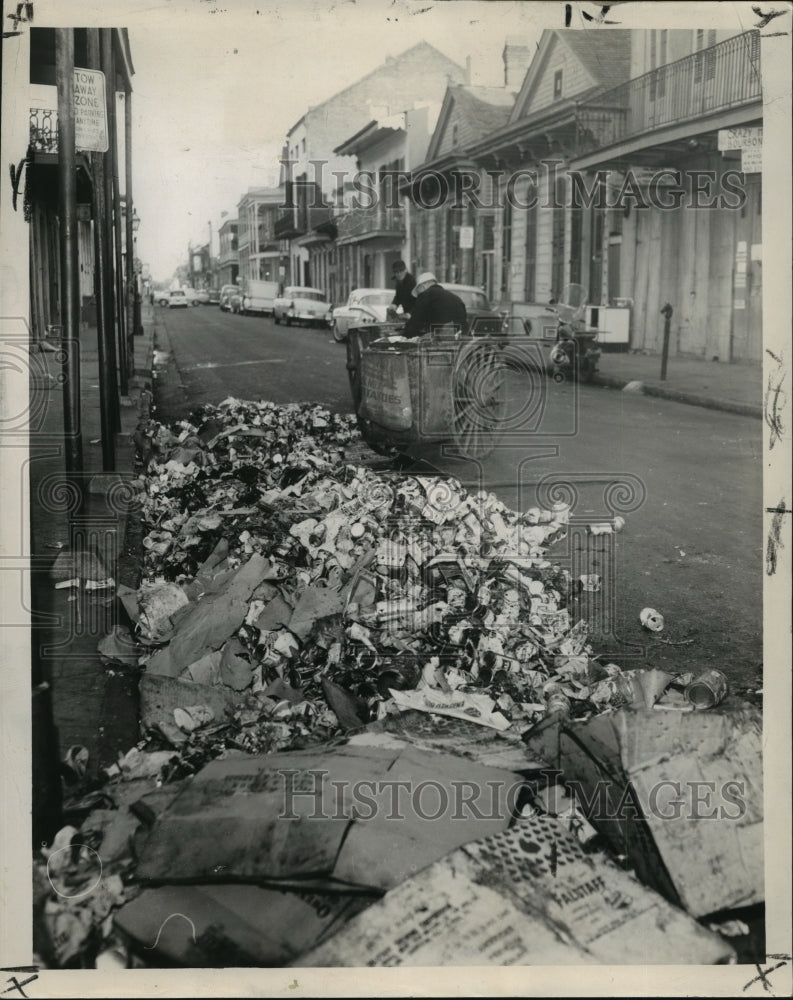 1963 Mardi Gras revelers leave more than 100 tons of trash in street - Historic Images