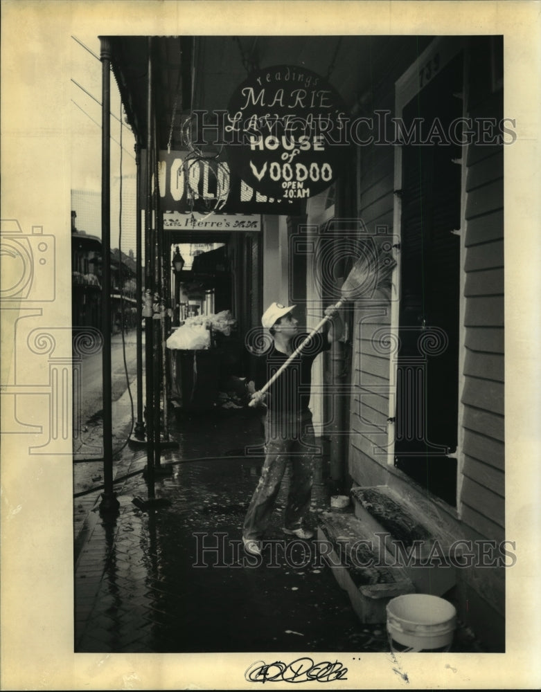 1992 Richard Wingate Washes Building &amp; Sidewalk after Mardi Gras - Historic Images