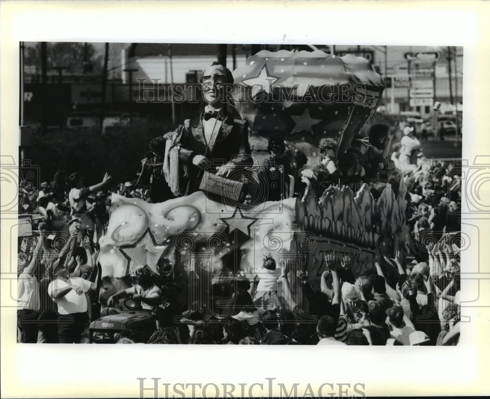 1990 Float in Krewe of Rhea Parade on Veterans Highway at Mardi Gras - Historic Images