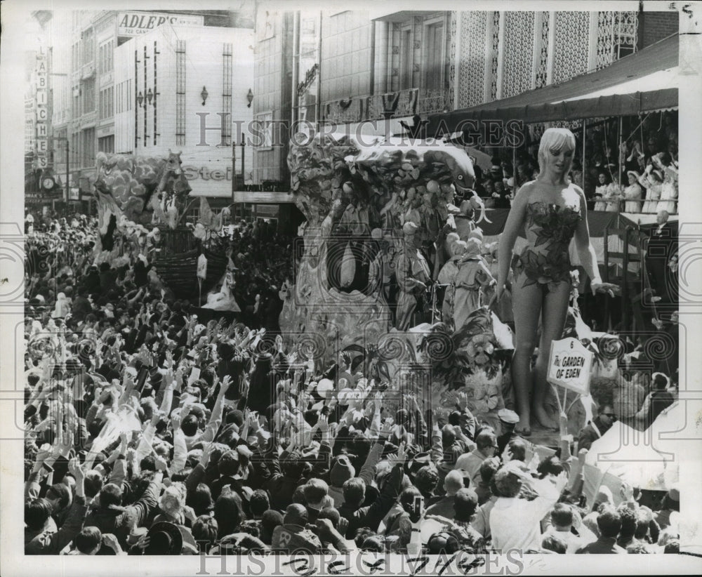 1969 Crowd Watches Krewe of Eve Garden of Eden Float in Parade - Historic Images