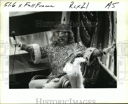 1996 King of the Rex Mardi Gras parade toasts his queen and crowd - Historic Images