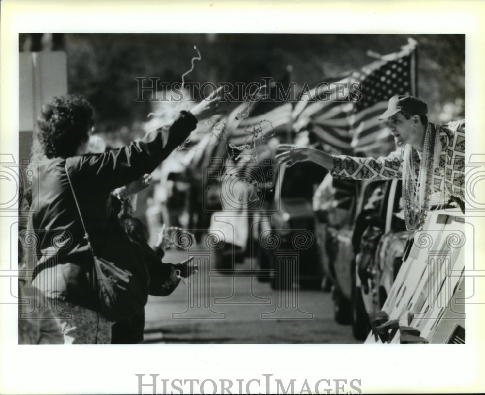 1991 Carnival Parade A float rider in Krewe of Wrecks Parade. - Historic Images