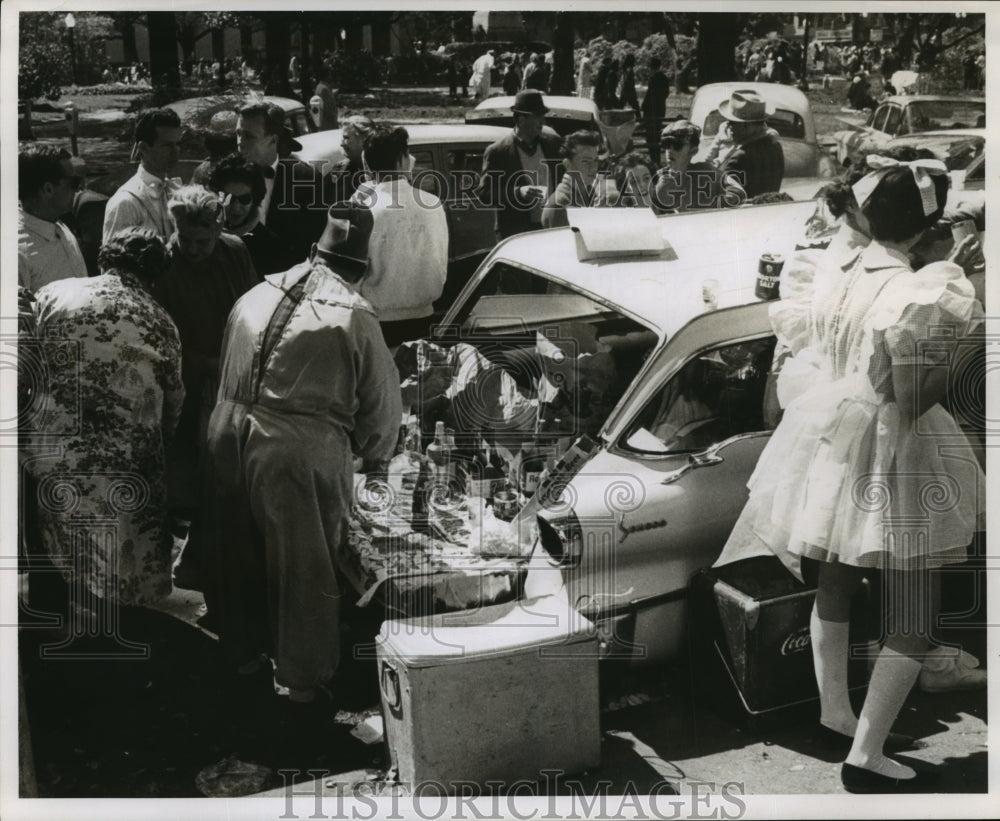 1962 Mardi Gras Revelers having a tail gate picnic  - Historic Images