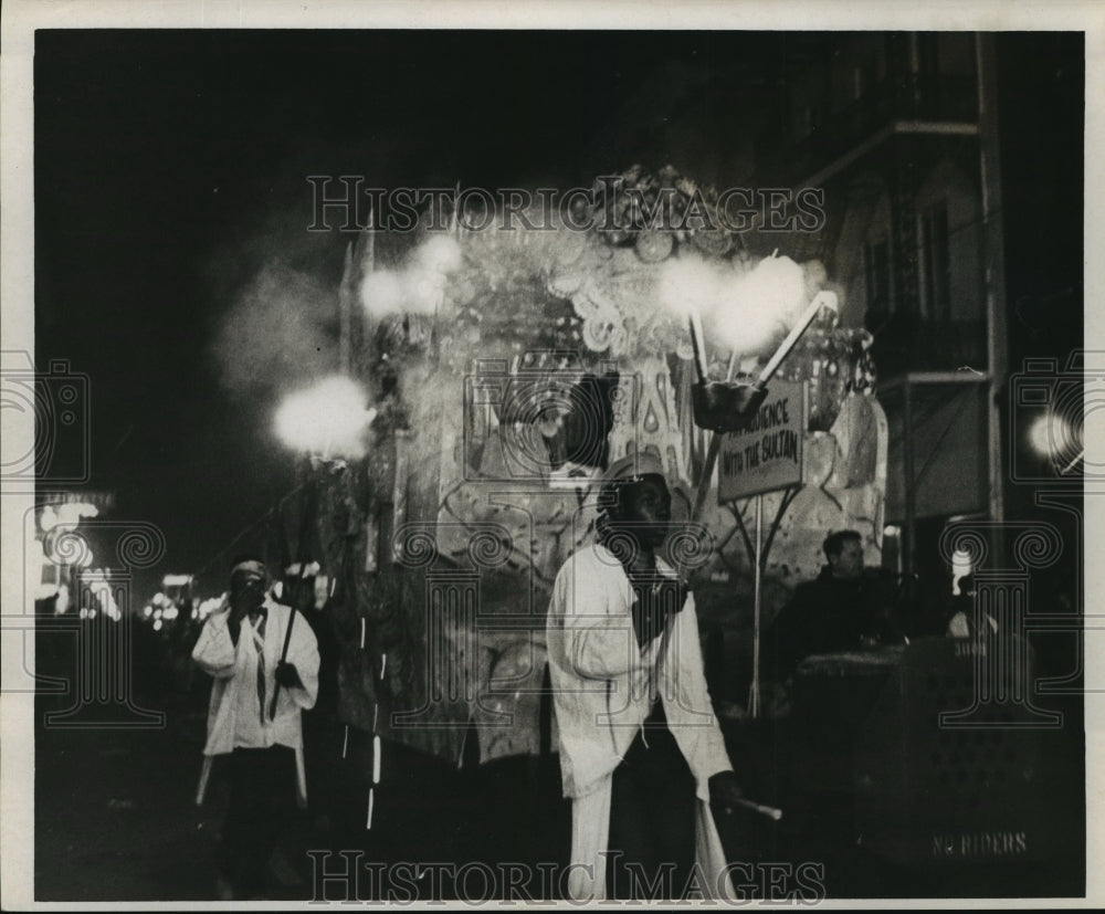 1966 Flambeaux carriers in a parade in New Orleans on Mardi Gras - Historic Images