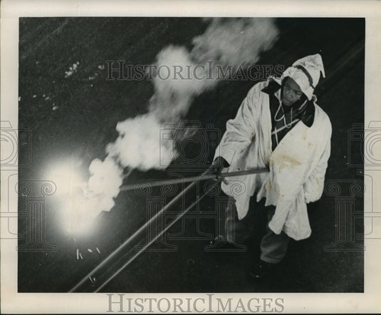 1965 Momus parade flambeaux carriers on Mardi Gras in New Orleans - Historic Images