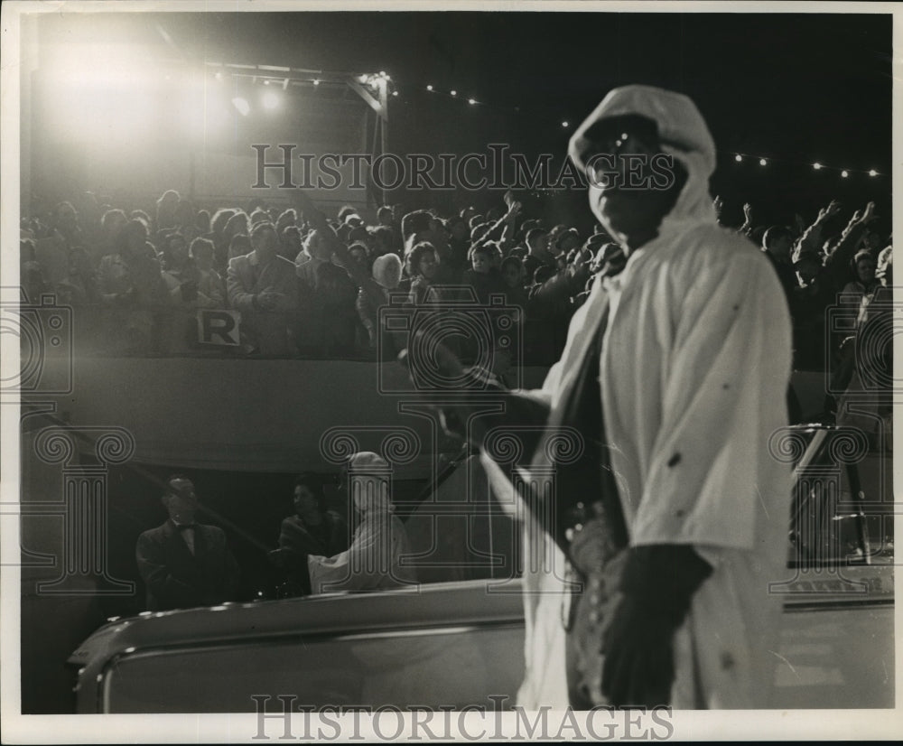 1964 Mardi Gras parade flambeaux carriers in New Orleans  - Historic Images