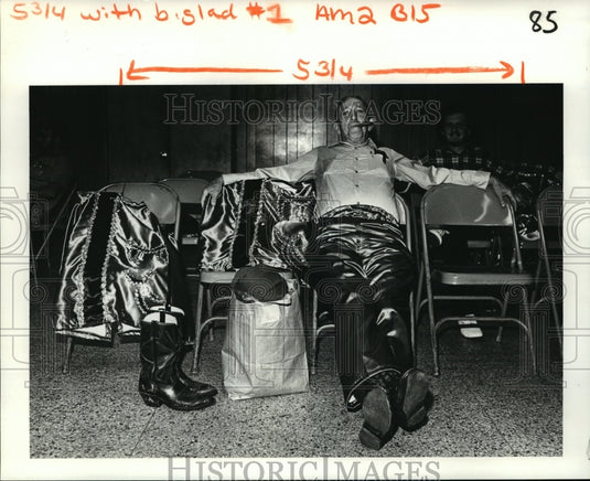 1982 Sal Corpora rests before Krewe of Gladiators Mardi Gras parade - Historic Images