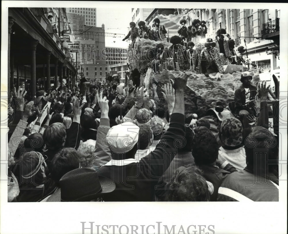 1983 Hands Beg for Throws from Zulu Parade Float at Mardi Gras - Historic Images