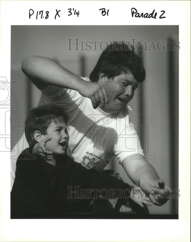 1993 Rock and Joshua Scallan Reach for Beads Little Rascals Parade - Historic Images