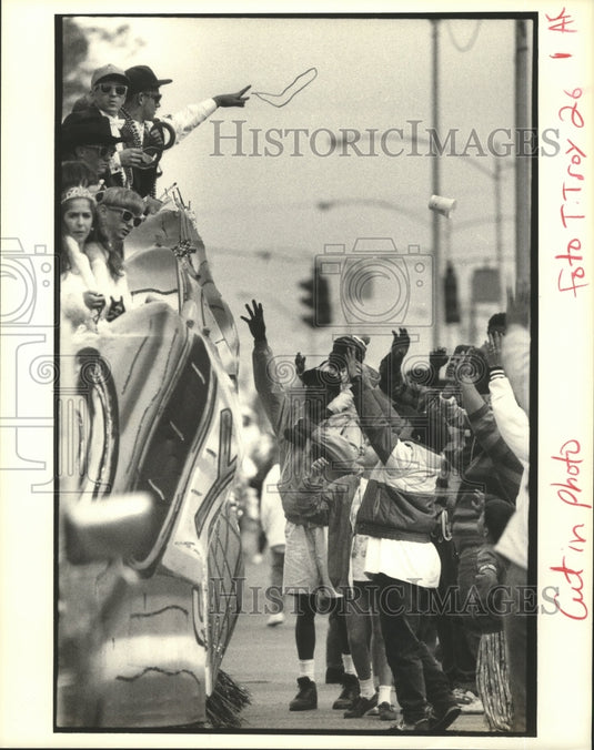 1993 Maskers on Parade Float Toss Beads to Spectators at Carnival - Historic Images
