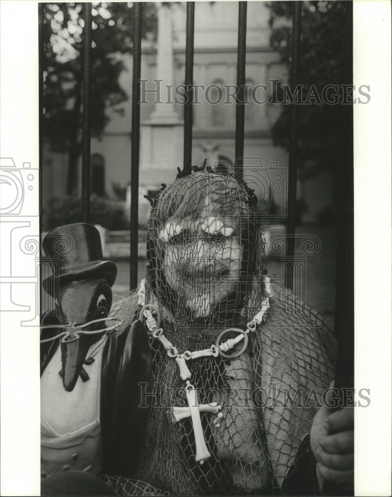 1981 Carnival Masker Covered in Netting at Mardi Gras  - Historic Images