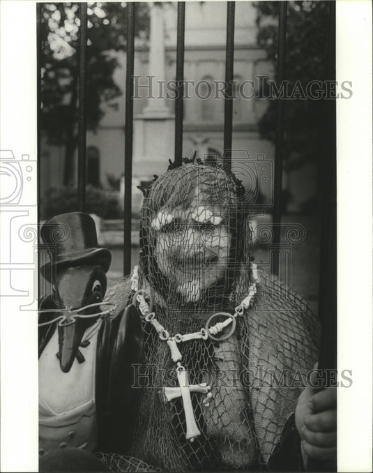1981 Carnival Masker Covered in Netting at Mardi Gras  - Historic Images