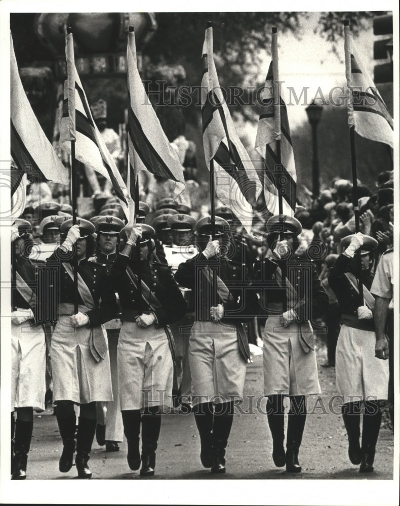 1987 Military band walks in the Thoth parade on Mardi Gras - Historic Images