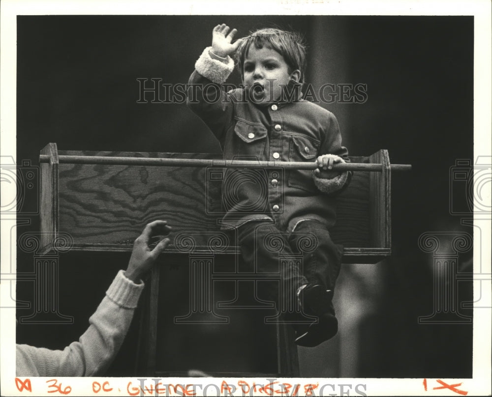 1987 Timothy Tracy, Age 3 Waves as Pandora Carnival Parade Passes - Historic Images