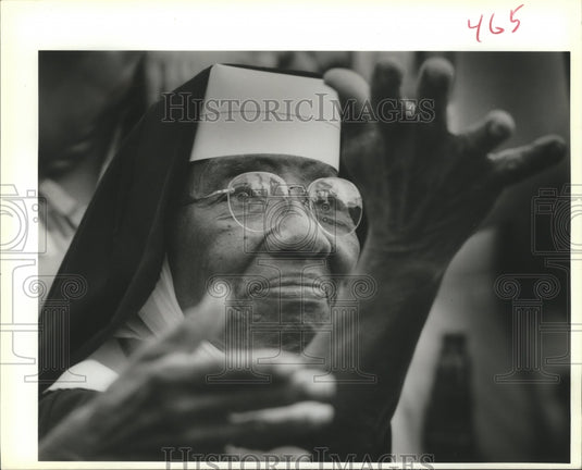 1989 Sister Justin Asks for Beads at Okeanos Parade at Mardi Gras - Historic Images