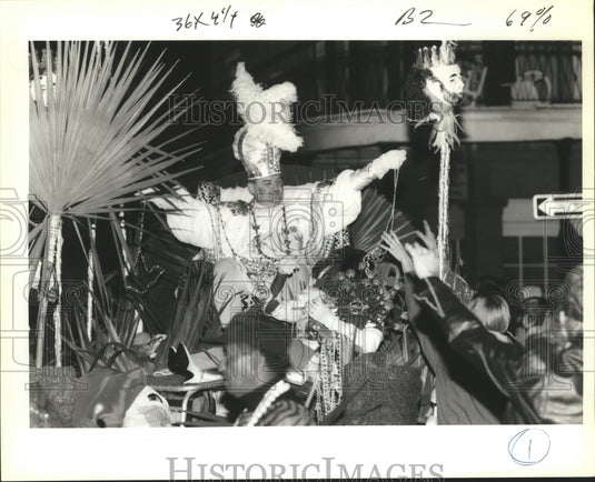 1993 Captain of the Krewe du Vieux Waves to Mardi Gras Crowd - Historic Images