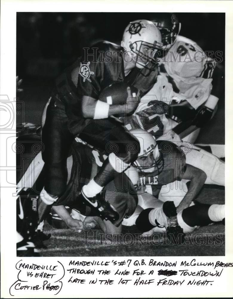 Press Photo Mandeville&#39;s Quarterback Brandon McCollum breaks through line- Historic Images