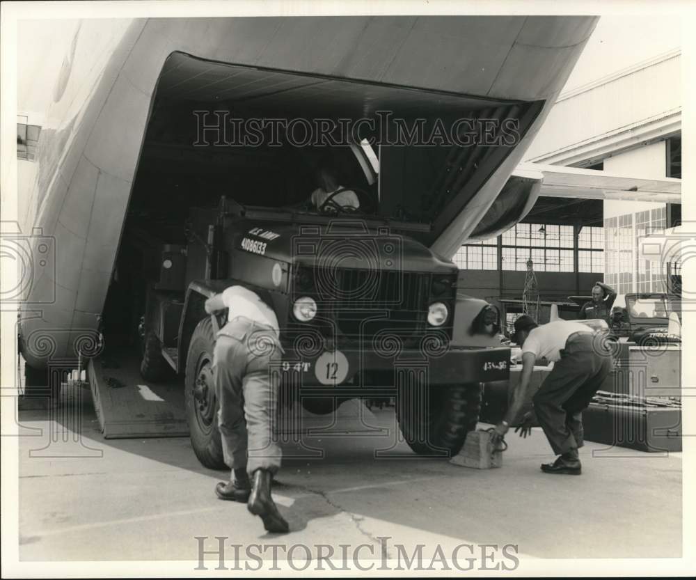 Press Photo Jeep Being Loaded into Army C-123 Cargo Plane - nom13987- Historic Images