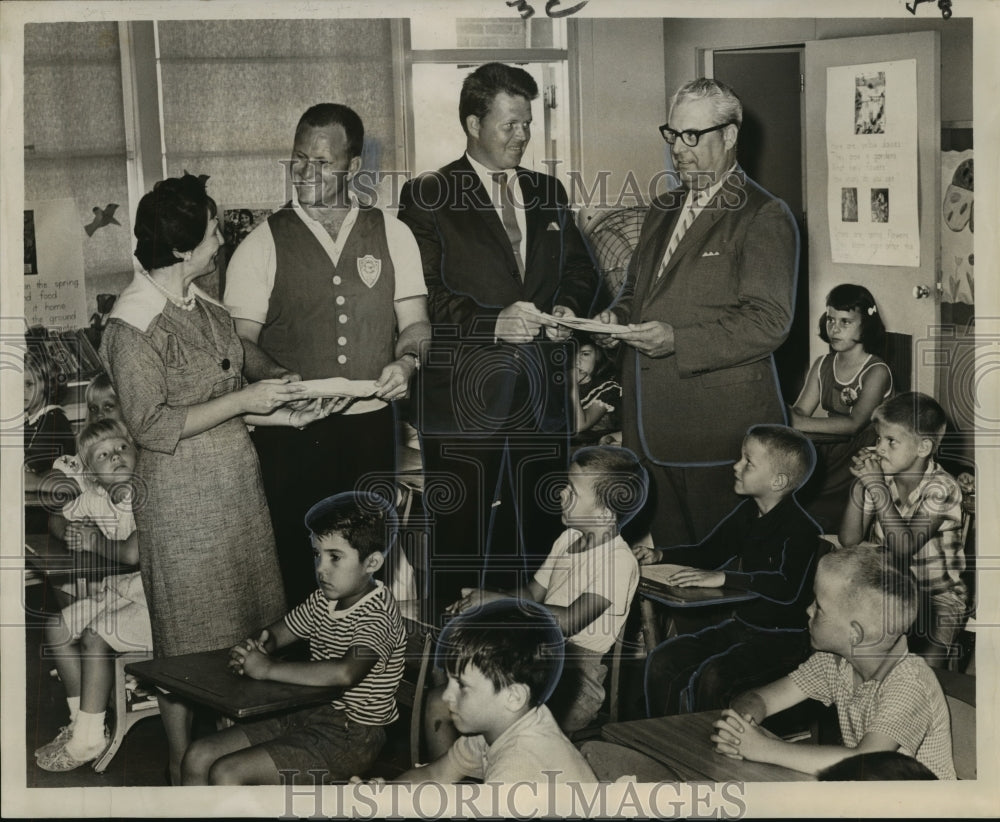 1964 Chamber of Commerce members distribute test kits for diabetes - Historic Images