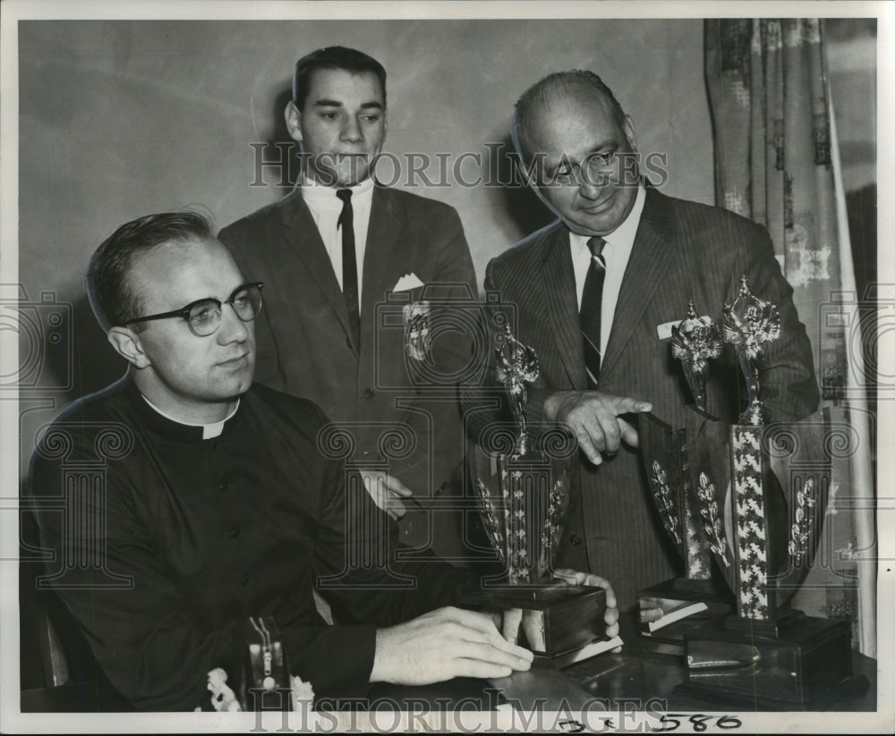 1966 Delegates inspect trophies for Variety Show at Hope Auditorium - Historic Images