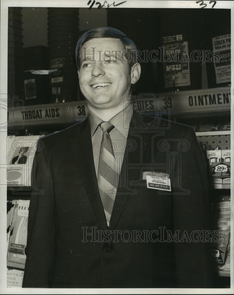 1969 Walgreen&#39;s manager Tom M. Brister prepares to open a new store - Historic Images