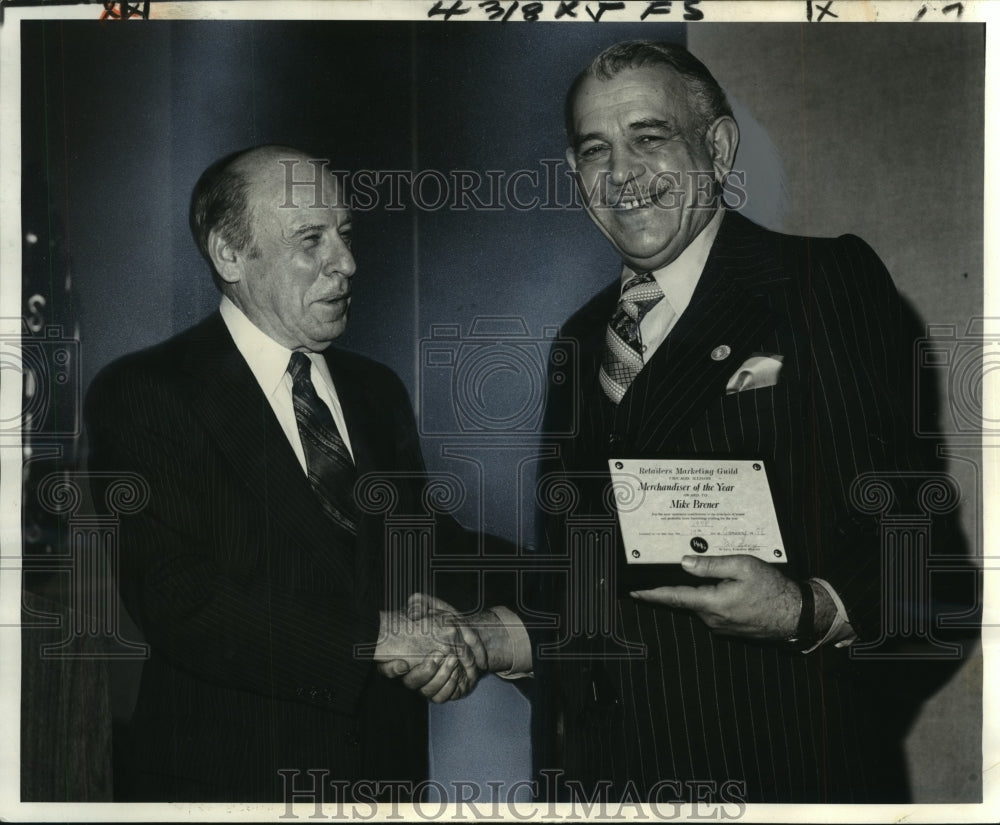 1978 Al Levy presents award to Mike Brener of Universal Furniture - Historic Images