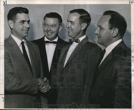 1957 Press Photo Officers elected by the Young Men's Business Club shake hands-Historic Images
