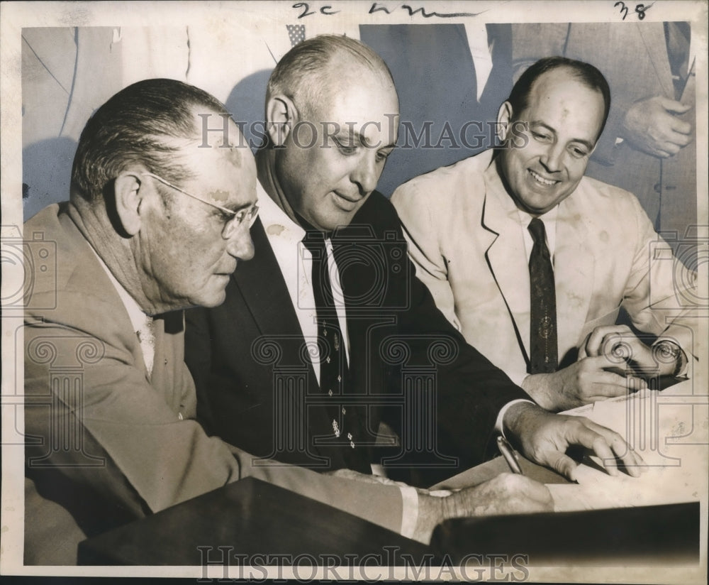 1957 E. R. McDonald, F. Lamar Clement, S. Morrison sign Act of Sale - Historic Images