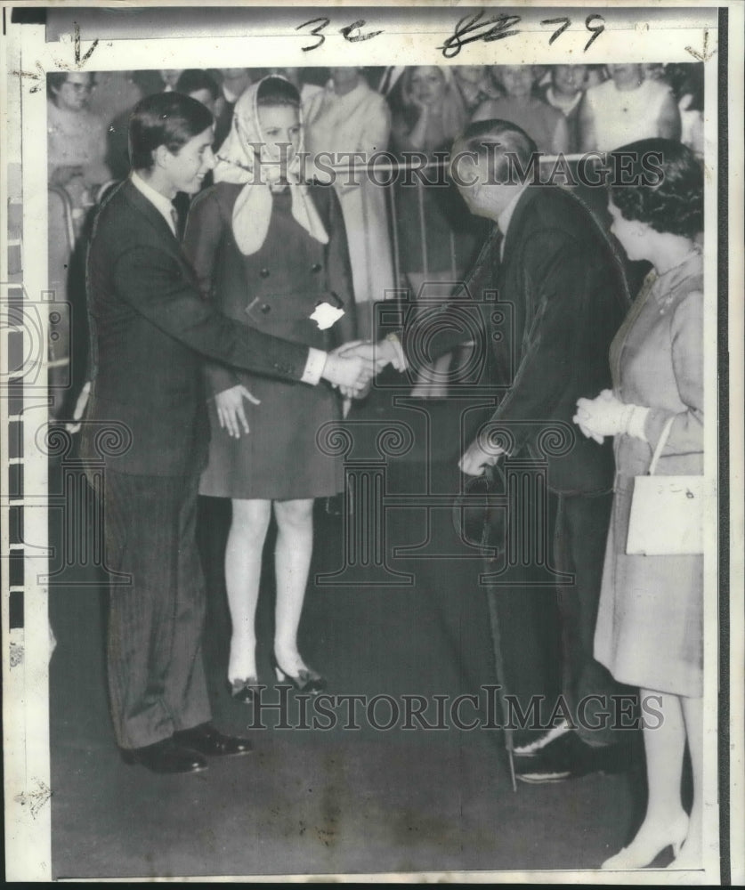 1969 Prince Charles of England greets the master of Euston Station - Historic Images