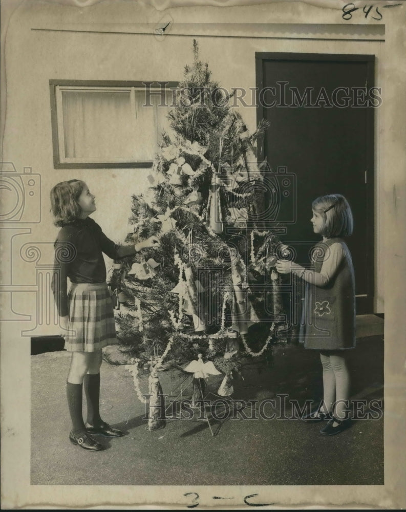 1969 Lisa Haughton and Nancy Bashen admire classroom Christmas trees - Historic Images