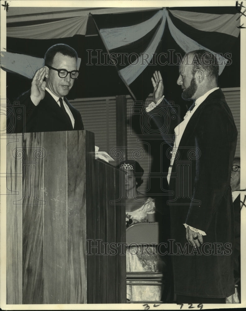 1963 Mayor Emile L. Menetre is sworn into office for is fifth term - Historic Images