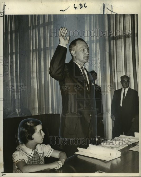 1964 Alwynn J. Cronvich Takes Sheriff's Oath as Ann Ward Looks On - Historic Images
