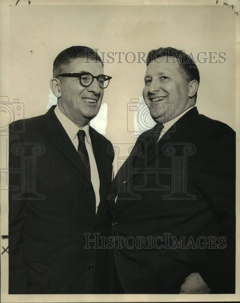 1965 Frank M. Cruger discusses import issues with Roy F. Gootenberg - Historic Images