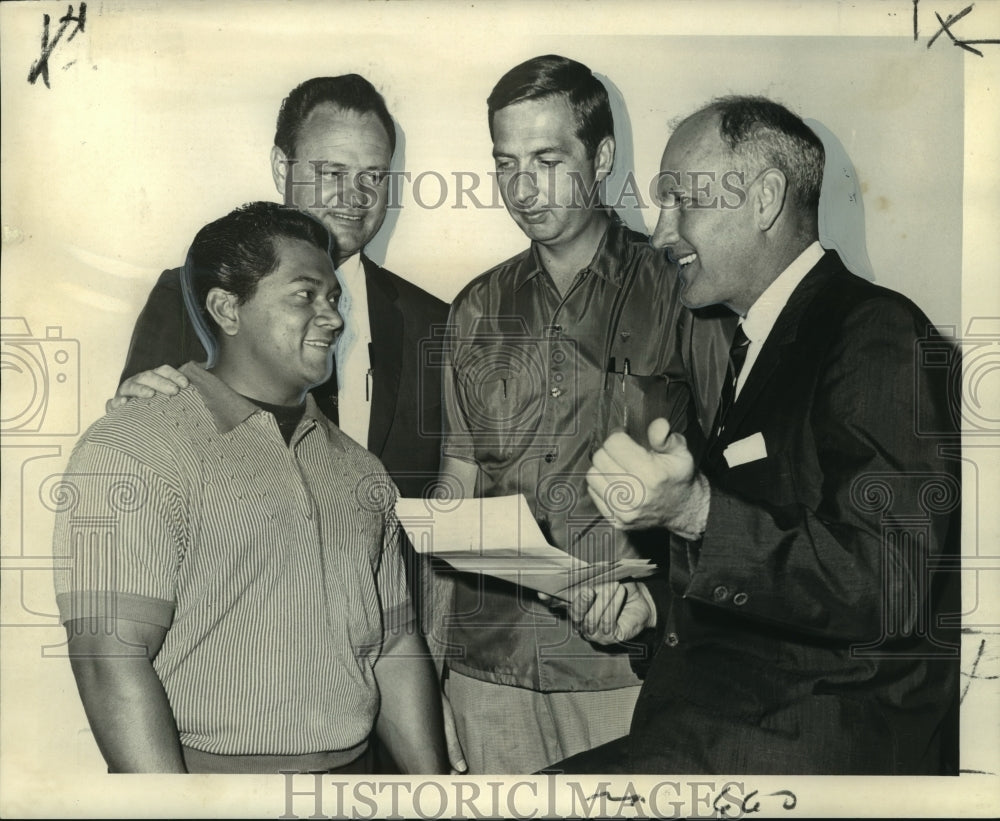 1967 Police officers discuss narcotics raid in Jefferson Parish - Historic Images