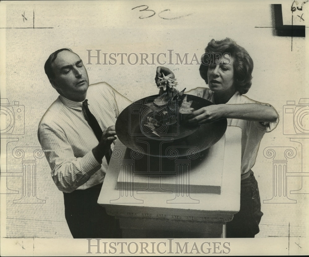 1962 James Byrnes of Delgado Museum helps sculpture Lin Emery-Historic Images