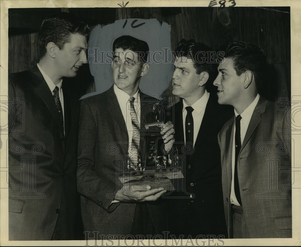 Press Photo Steve Dimab, second from left, holding trophy - noo09129- Historic Images