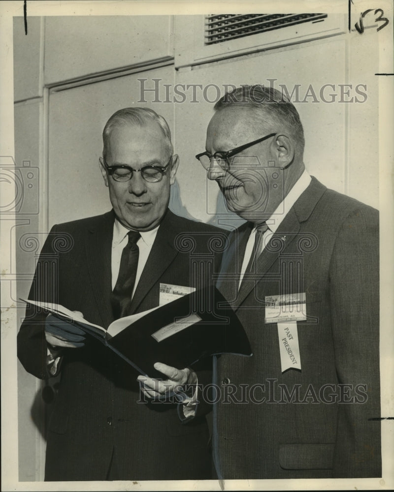 1963 J. Clemson Duckworth &amp; Frank B. Yielding Jr. looking over notes - Historic Images