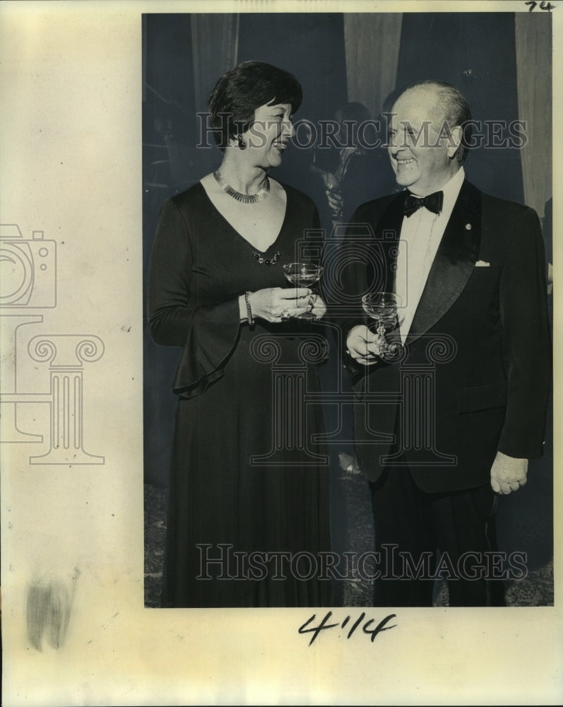 1977 Mr. &amp; Mrs. Henri Etienne attend the Athenee Louisianais party - Historic Images