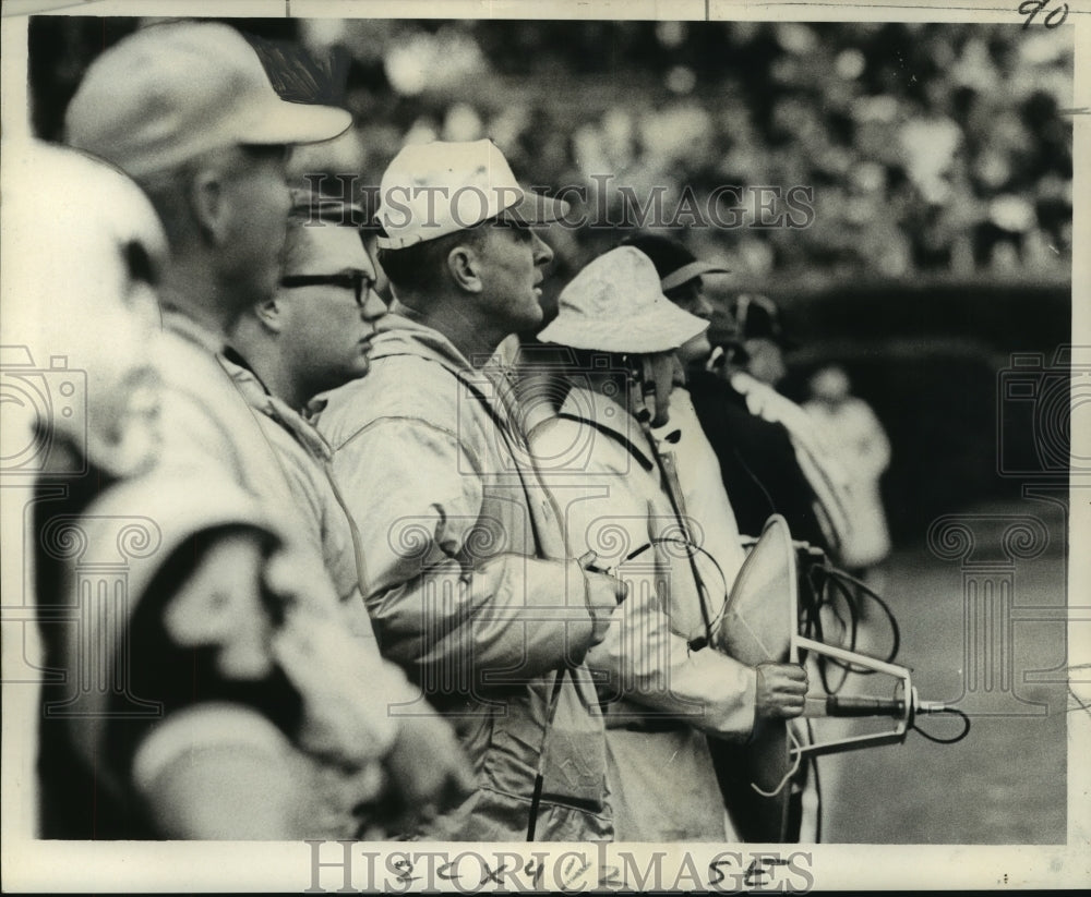 1968 Coach Eaton of Wyoming on Cowboys sideline - Historic Images