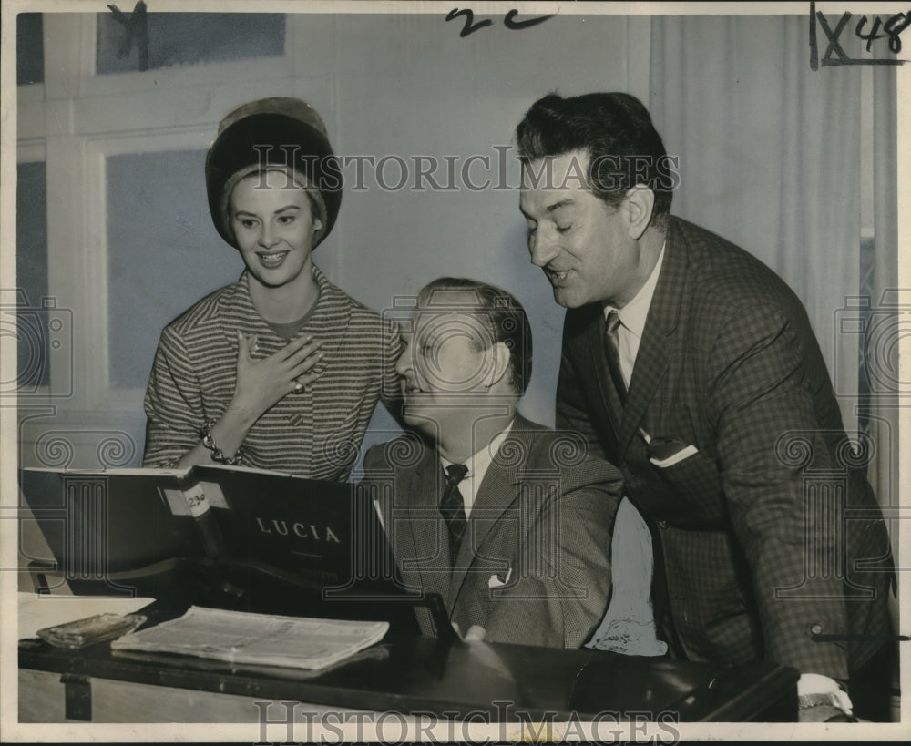 1962 Group rehearses and checks the score of &quot;Lucia di Lammermoor&quot; - Historic Images