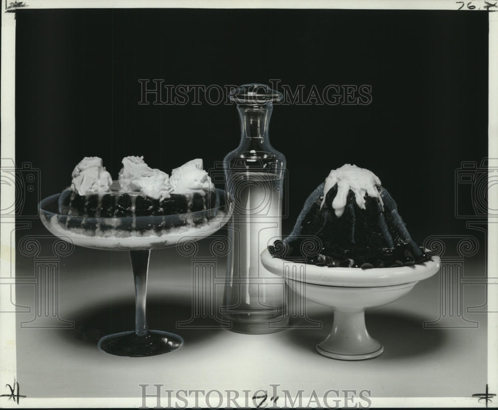 Press Photo Food - Two Cake Desserts with Bottle of Water - noo18141 - Historic Images